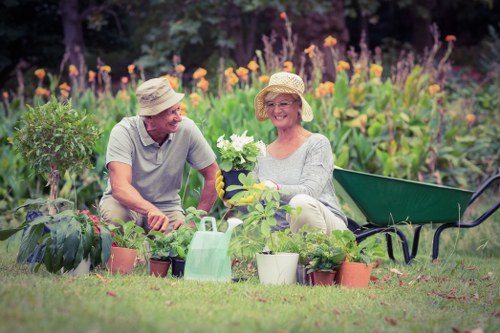Team of gardeners working in Wallington holding a policy document