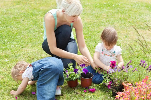 Risk assessment checklist and safety signage on a garden site
